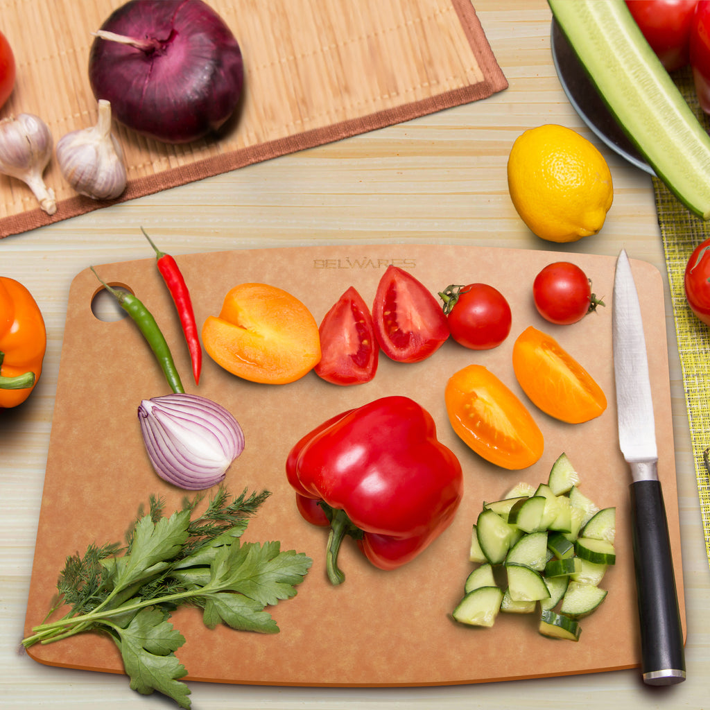 Belwares natural flat composite cutting board used for vegetable preparation